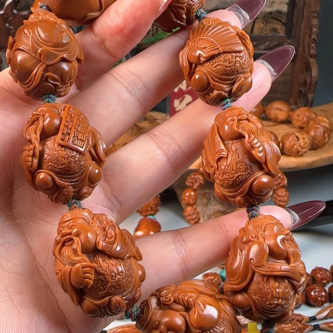 橄榄核手串/手链宽2.4鸡血红水晶核深雕龙财神手持手串