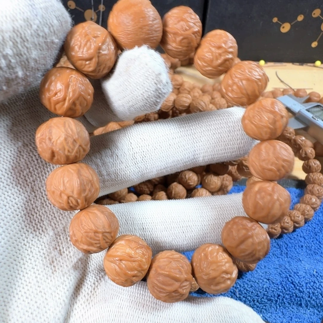 一***人猴头核桃手串猴头雕刻毒液手串