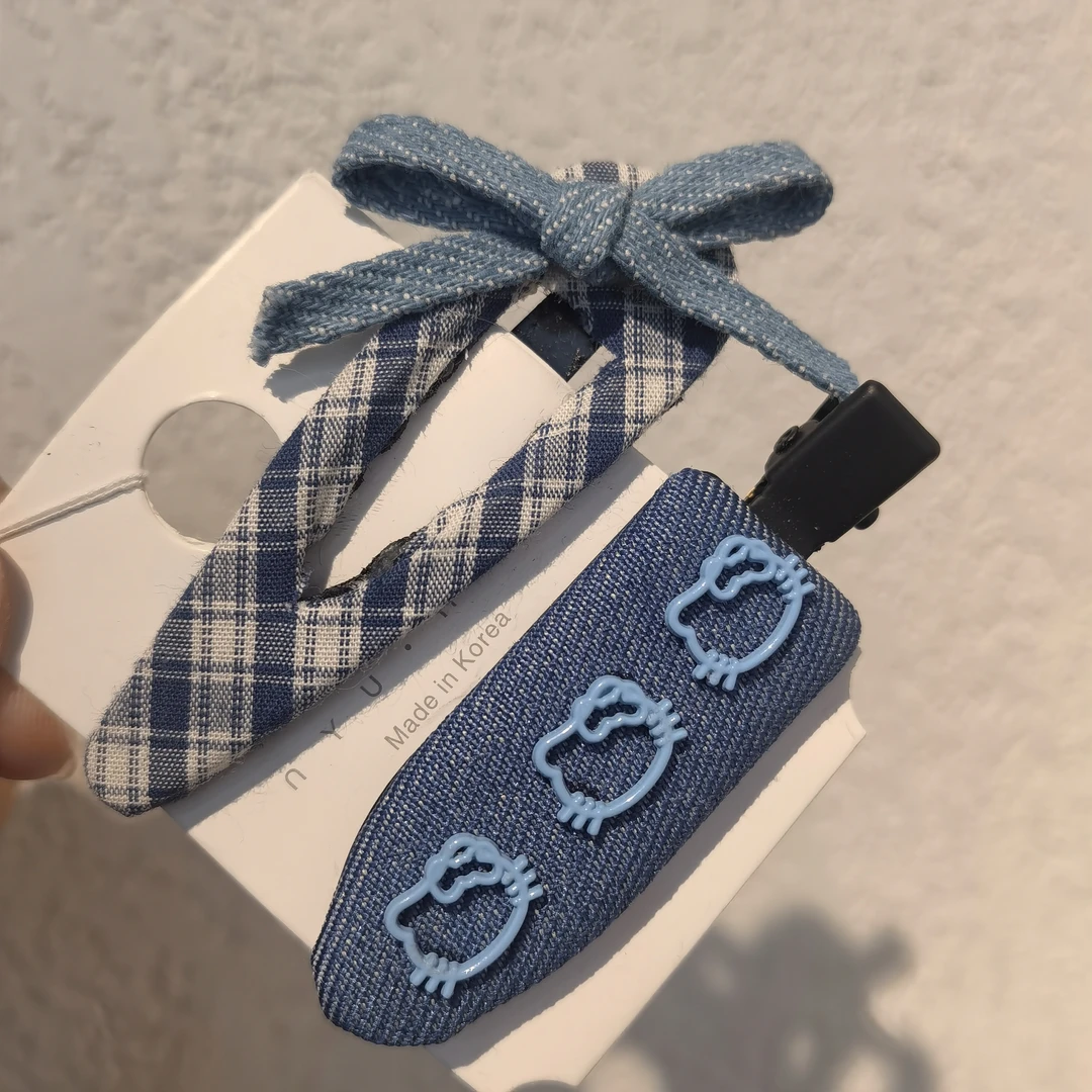 B908蓝色牛仔蝴蝶结KT猫咪无痕夹掰掰夹一对