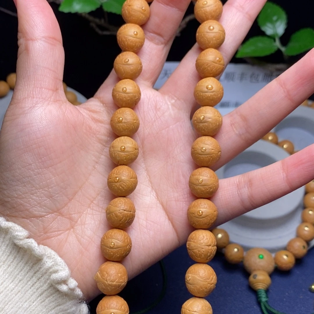 凤眼菩提吊坠12.5手持