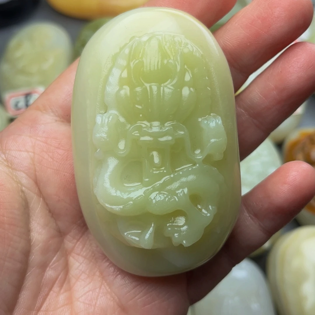 石材方解石手把件龙