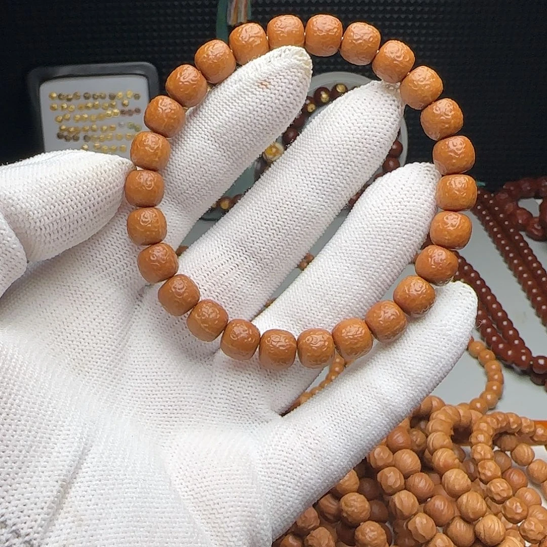 黎***.猴头核桃吊坠波澜