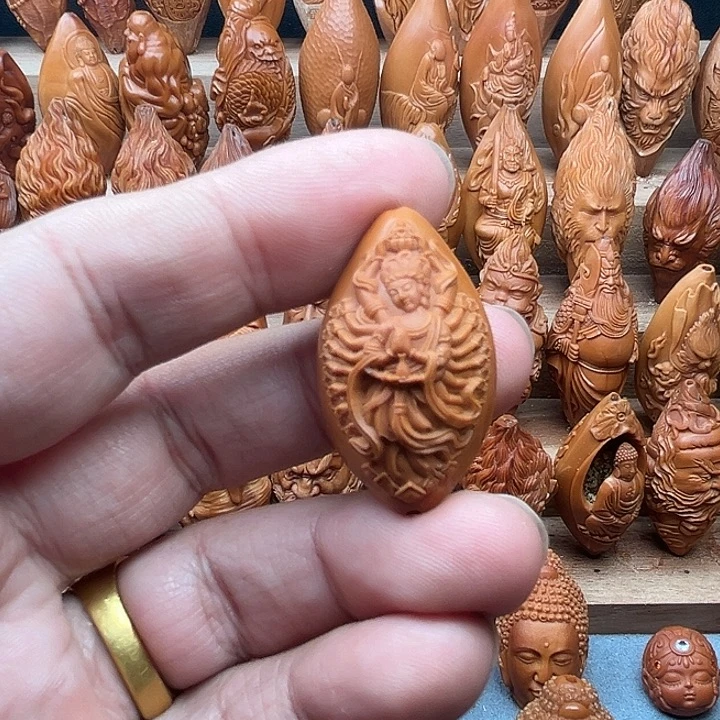 橄榄核吊坠21千手观音