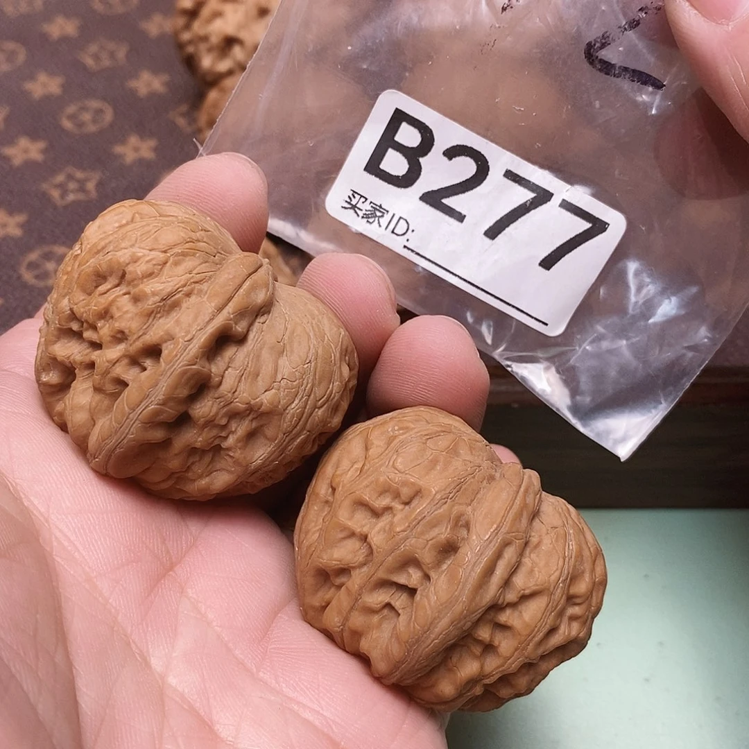 文玩核桃把件元宝42尺。