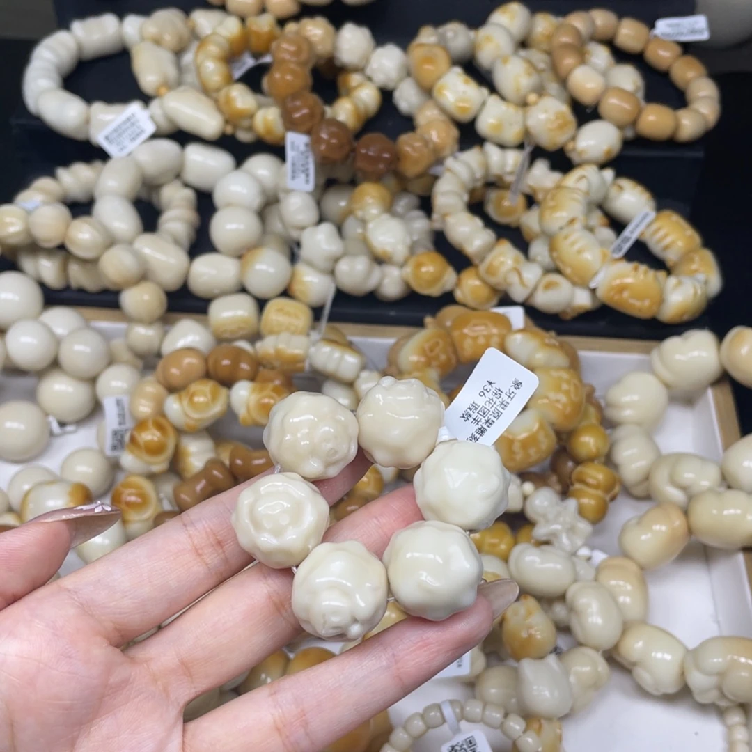 吊坠菩提根/象牙果92935羊手捻瑕疵