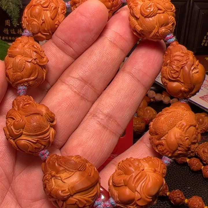 吉***羿橄榄核手串九路财神