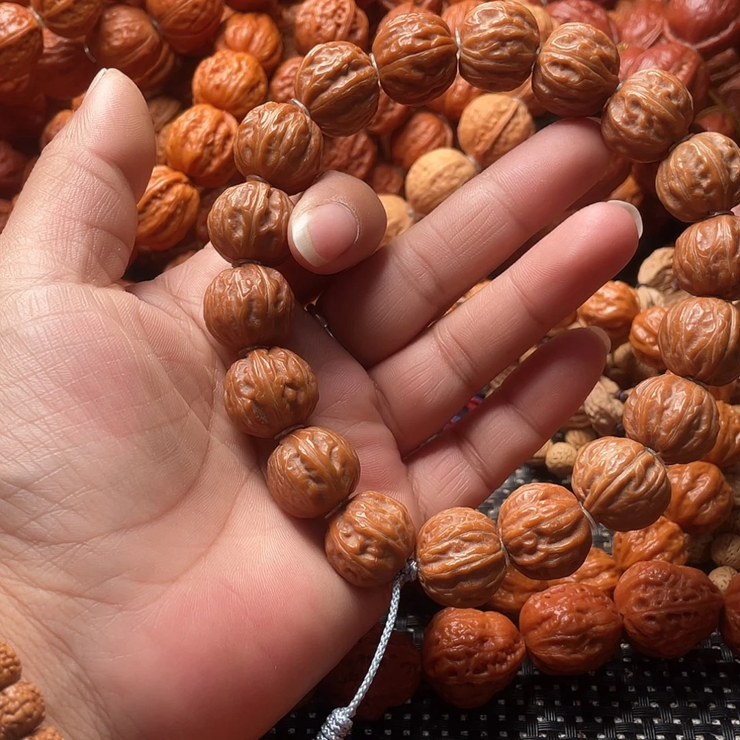 孤***翁文玩核桃手串树王