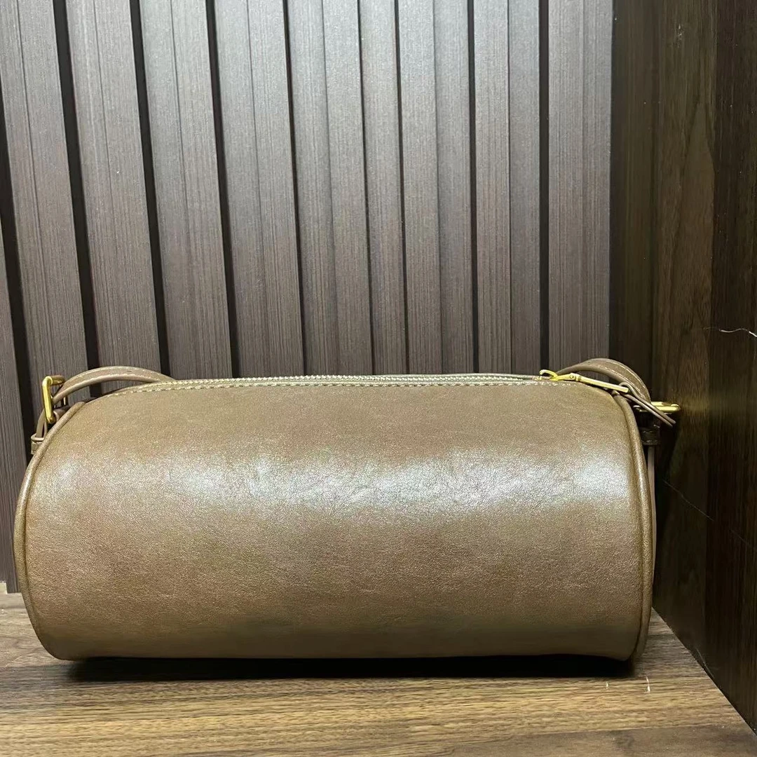 时尚潮流真皮新款女包手提包斜挎包 枕头 0448 棕色圆桶