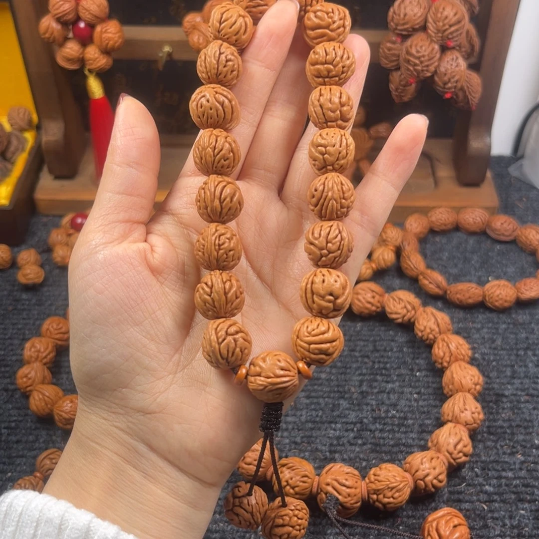 吊坠桃核桃枭手持L5