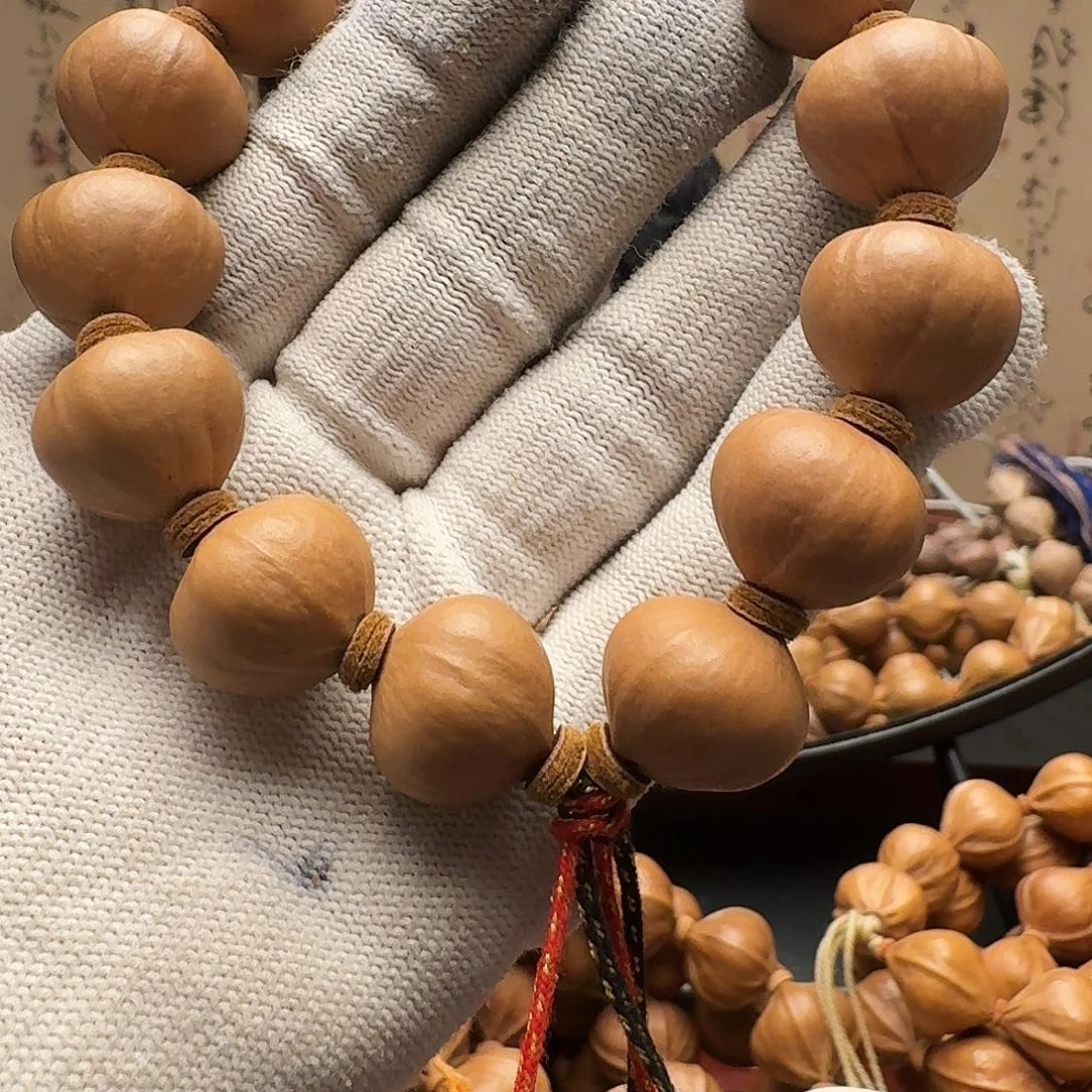 琪***手串橄榄核铁核南瓜籽