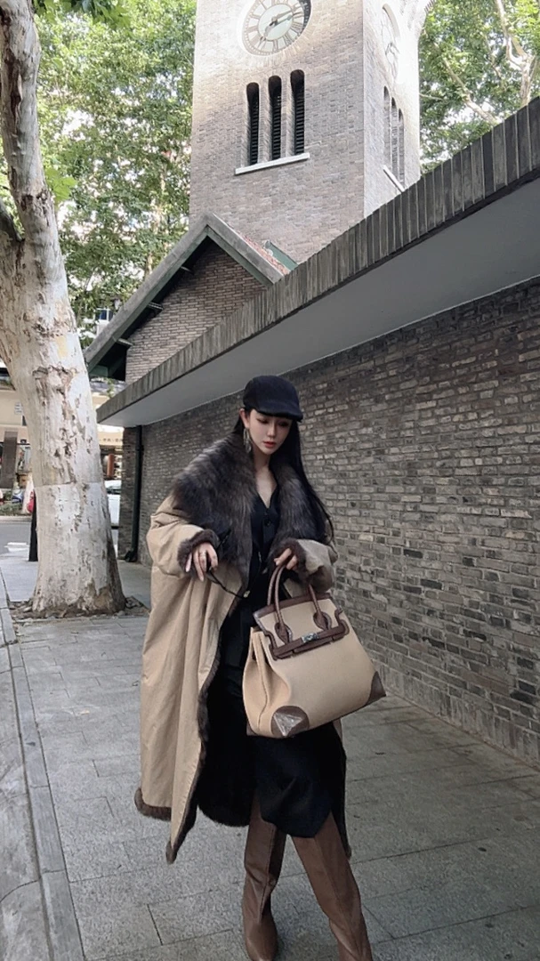 摩登佳人）原创设计师款进口貉子毛双面皮草派克冬季新款外套25140