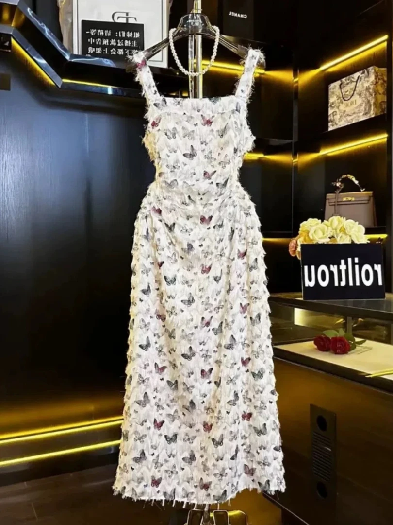 D2705碎花吊带连衣裙夏季新款法式蝴蝶流苏气质收腰显瘦海边长裙