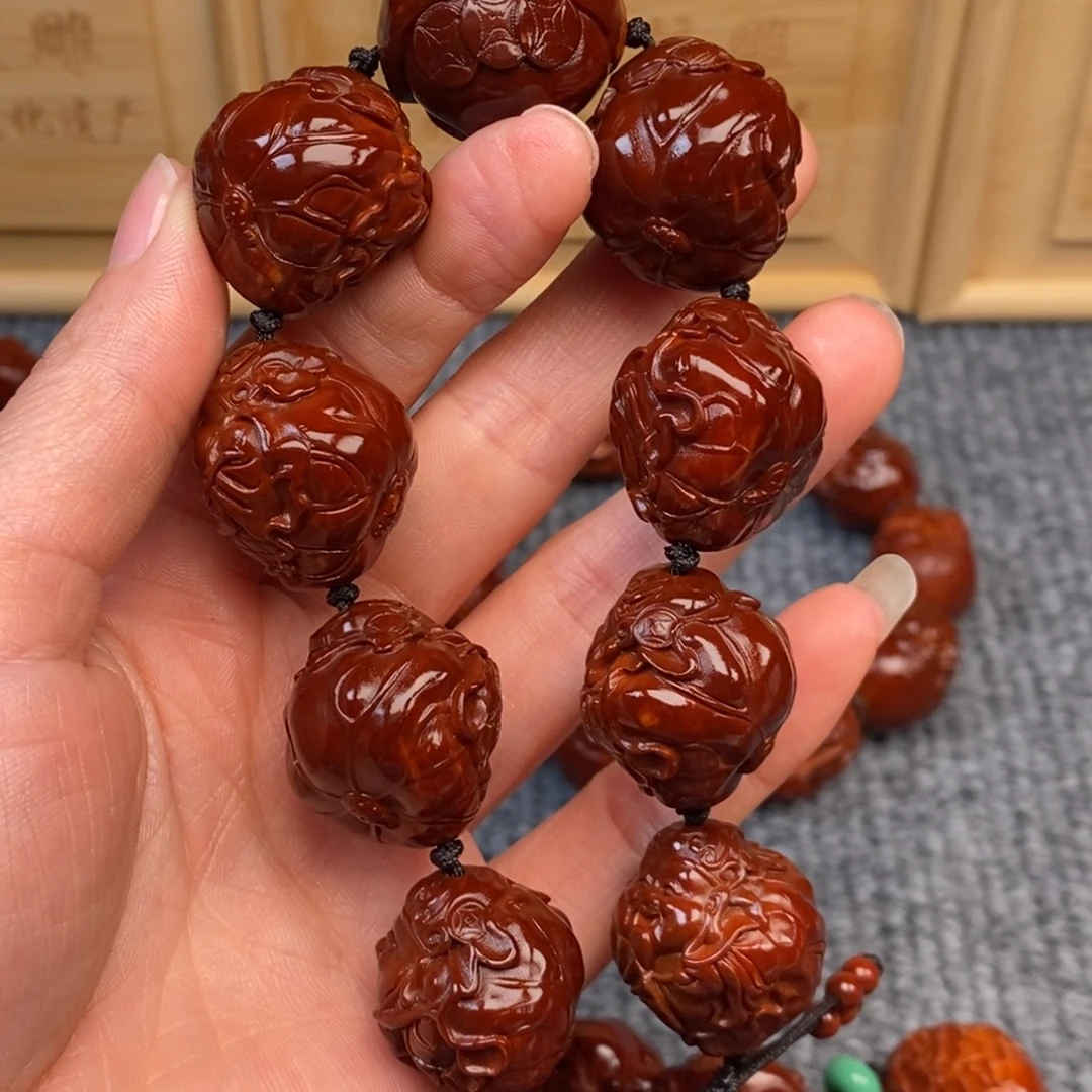 卢***铭橄榄核手串/手链荷叶财神