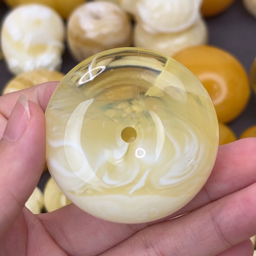 未镶嵌琥珀裸石荧光拉丝溶洞