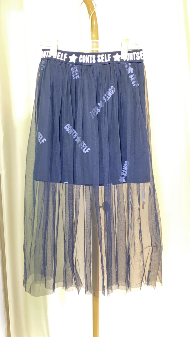 A521遂空黑印字网纱中腰拼接X型百搭半身裙女装半裙A字时尚短裙