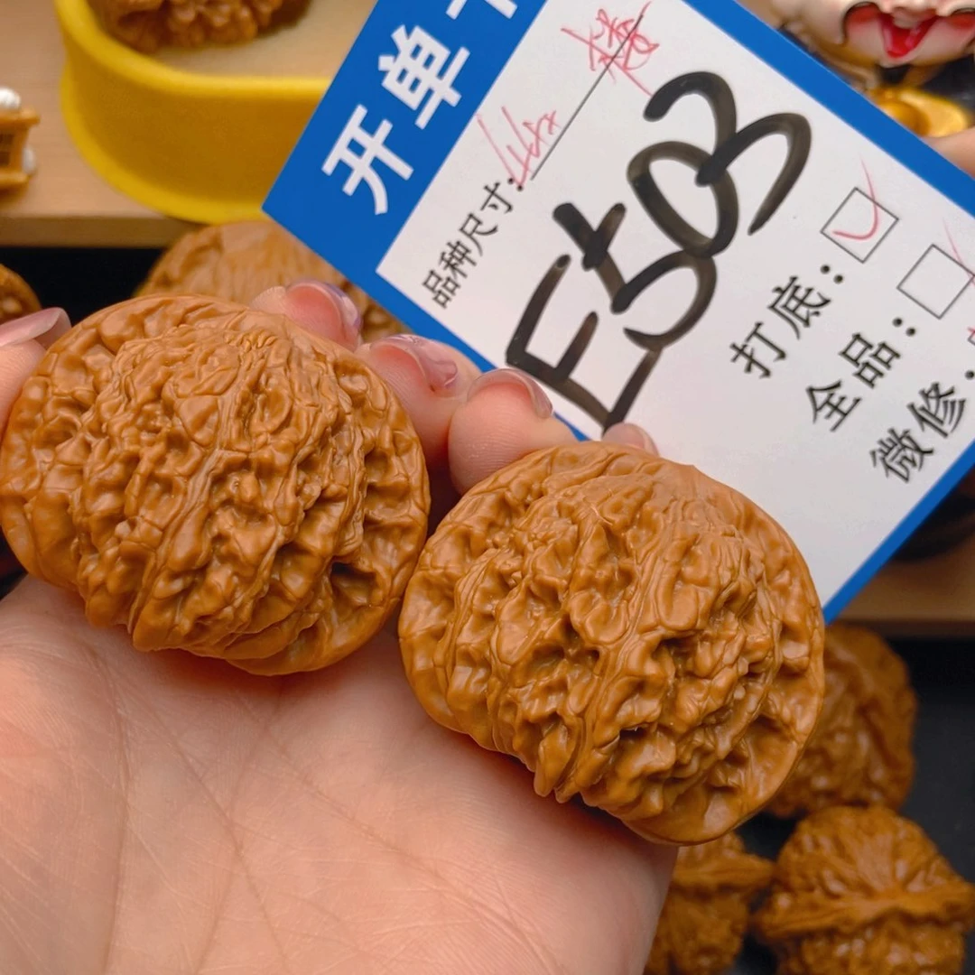 桃核吊坠四座楼狮子头