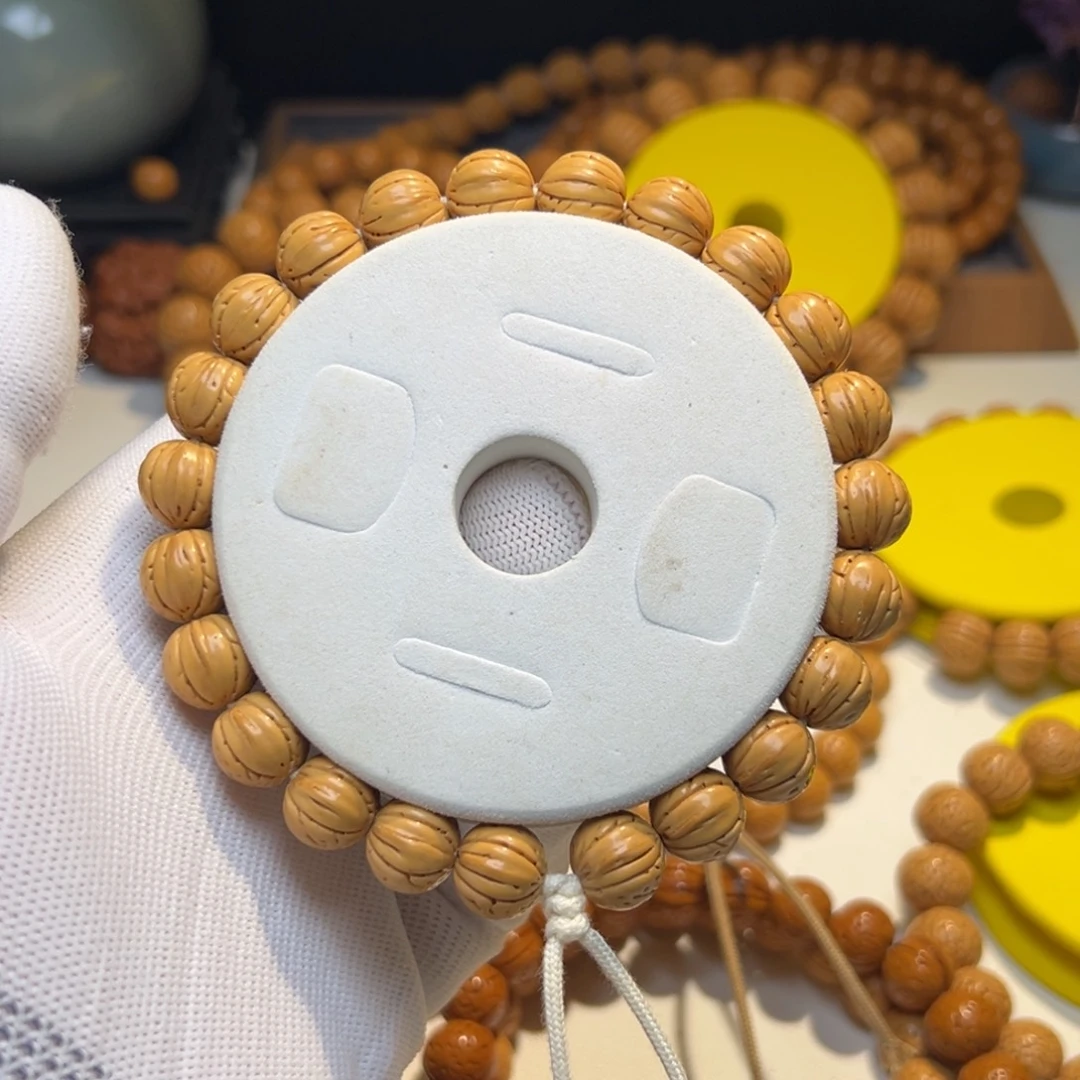 曹***.手串桃核奶油核叶