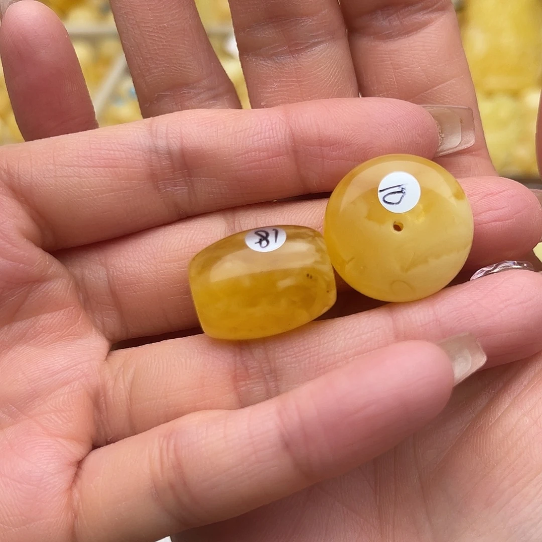 小***凉琥珀未镶嵌裸石蜜蜡瑕疵桶珠墩子鸽