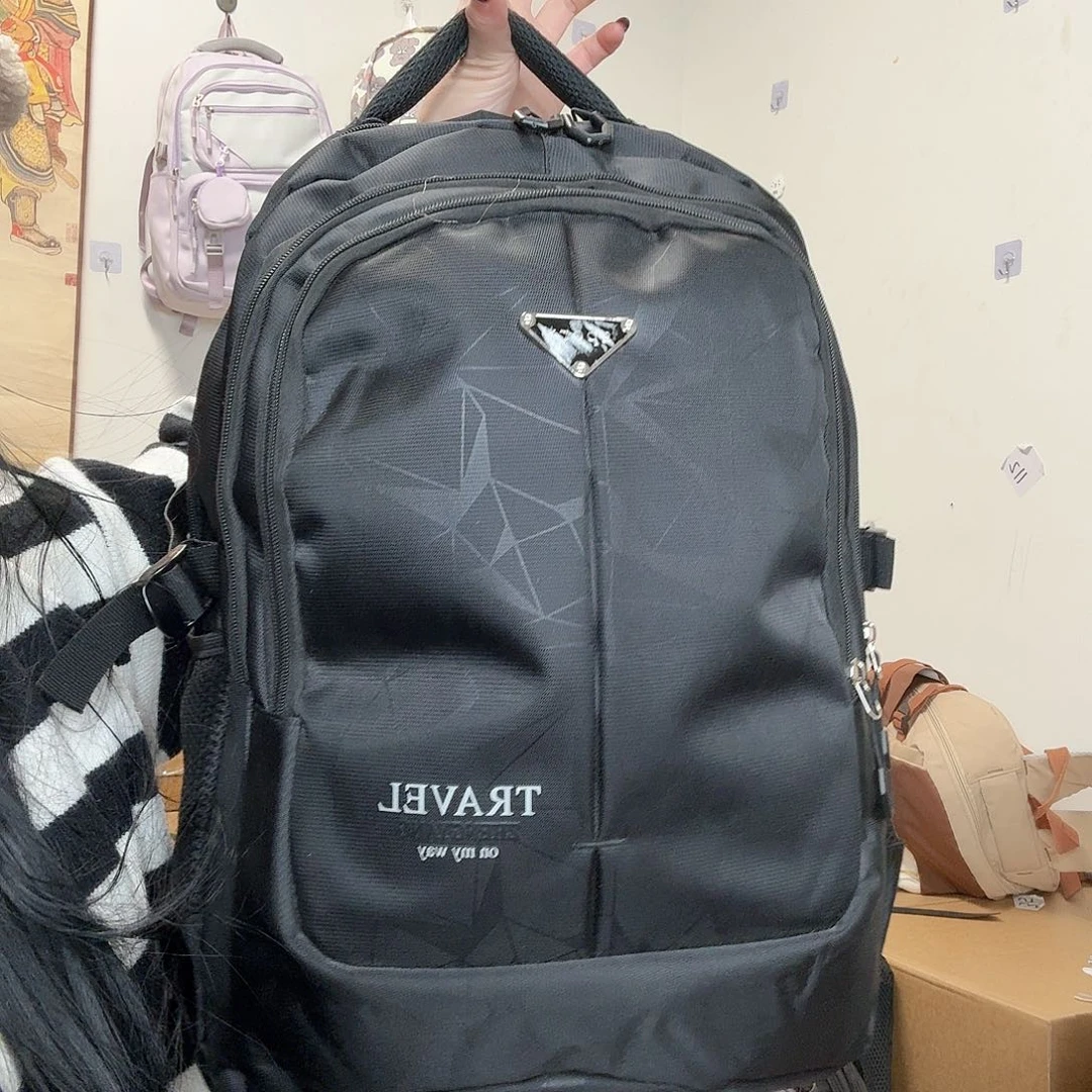 锦***鸿双肩包学生书包双肩