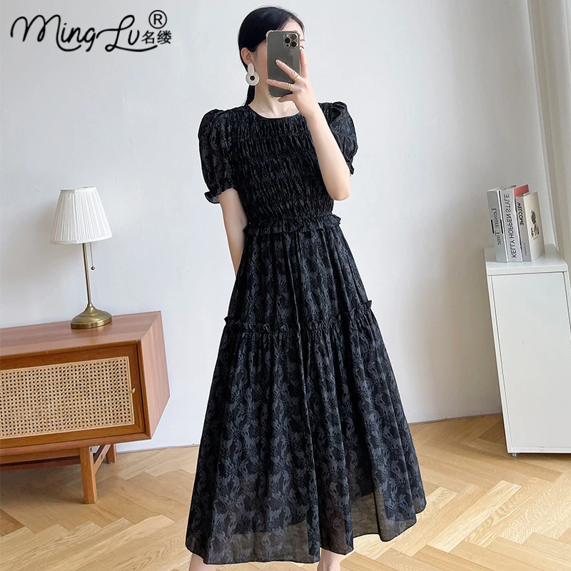 2025夏季新款泡泡袖气质显瘦过膝长裙女赫本风圆领印花黑色连衣裙