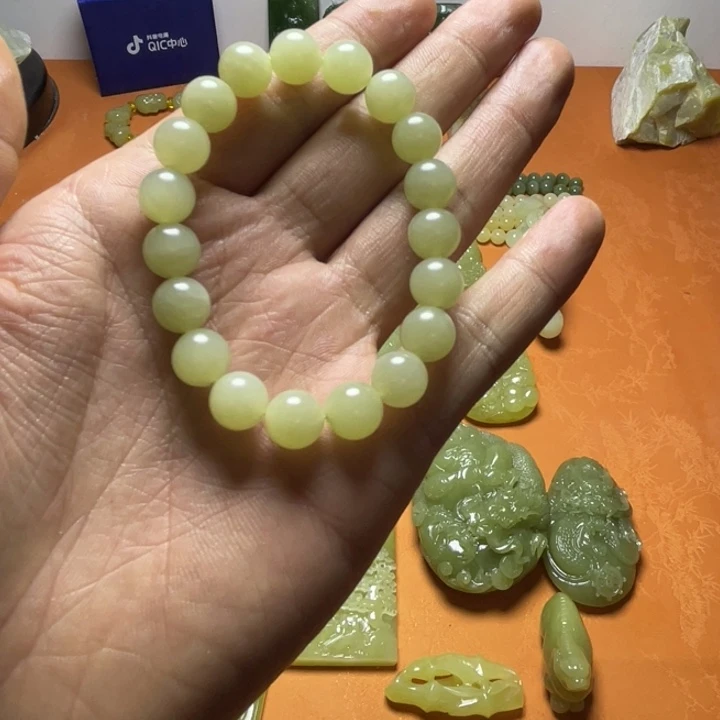 非金属新疆黄口卡10手串