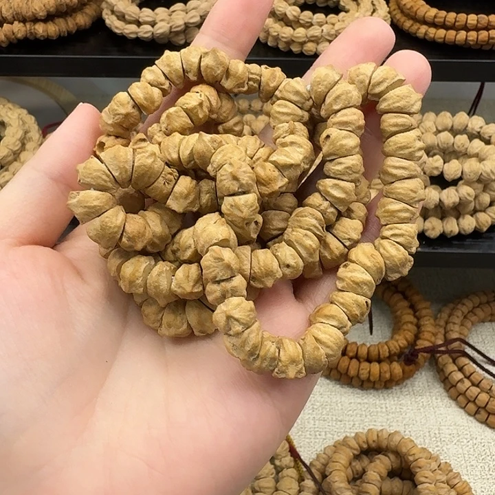 觉***心柏香籽/百香籽吊坠