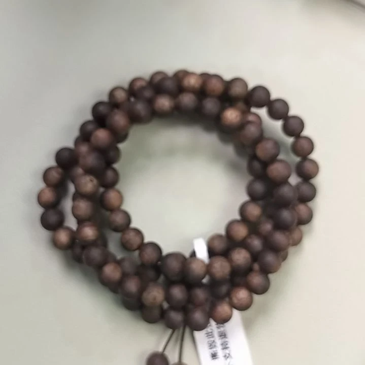 沉香手串(莺歌绿奇楠多圈)0.7*18g+九九沉