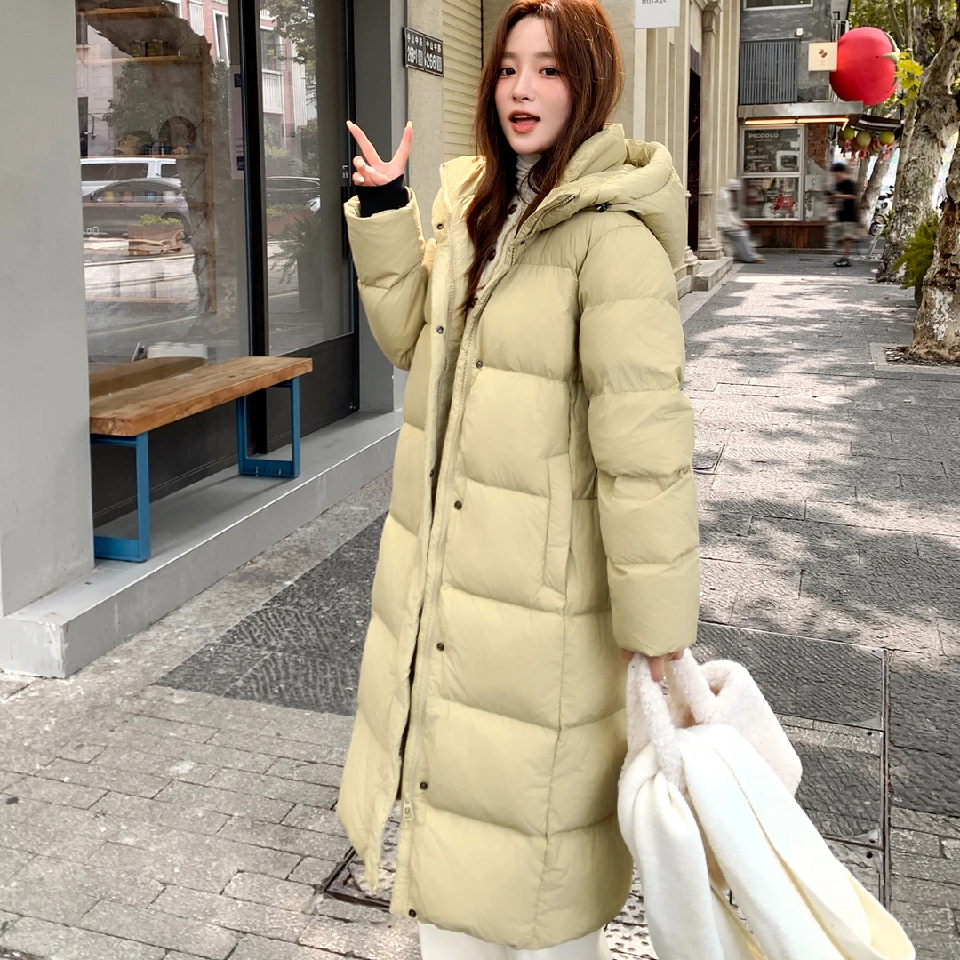 冬新款95白鸭绒宽松过膝长款羽绒服女连帽加厚保暖简约中长款外套