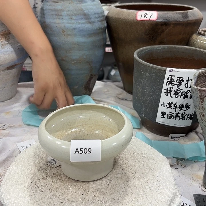 摆件高9，口12，有孔509