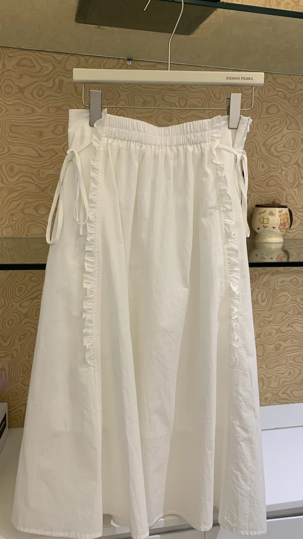 春夏中长款显瘦花瓣设计休闲白色半身裙