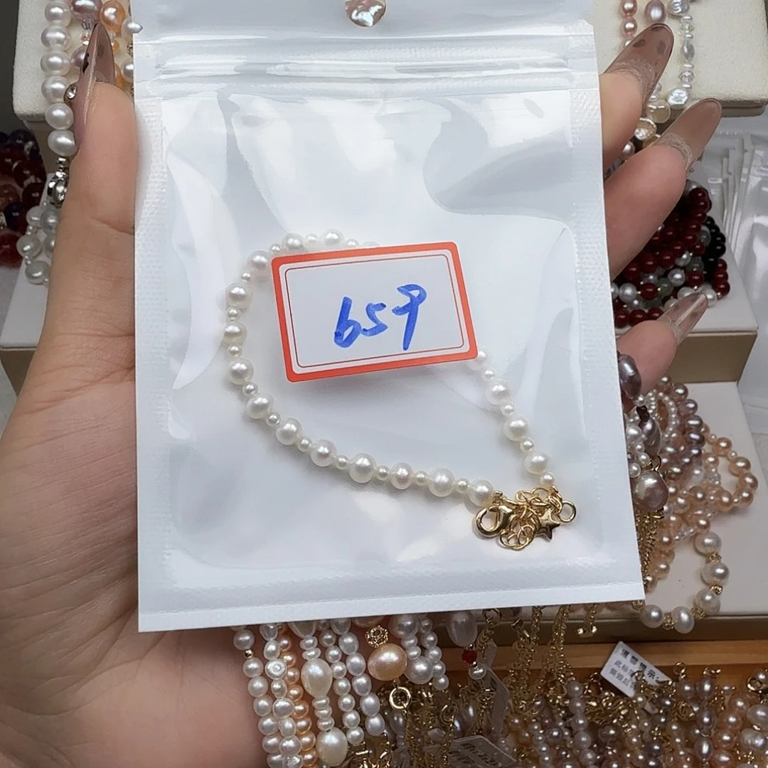 爱***੭钛钢淡水珍珠手绳