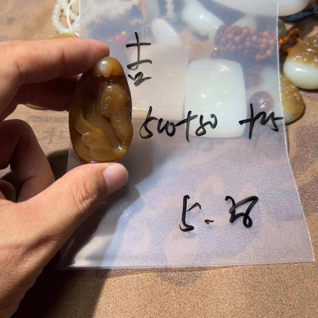 和田玉（糖玉）未镶嵌车挂吉**子