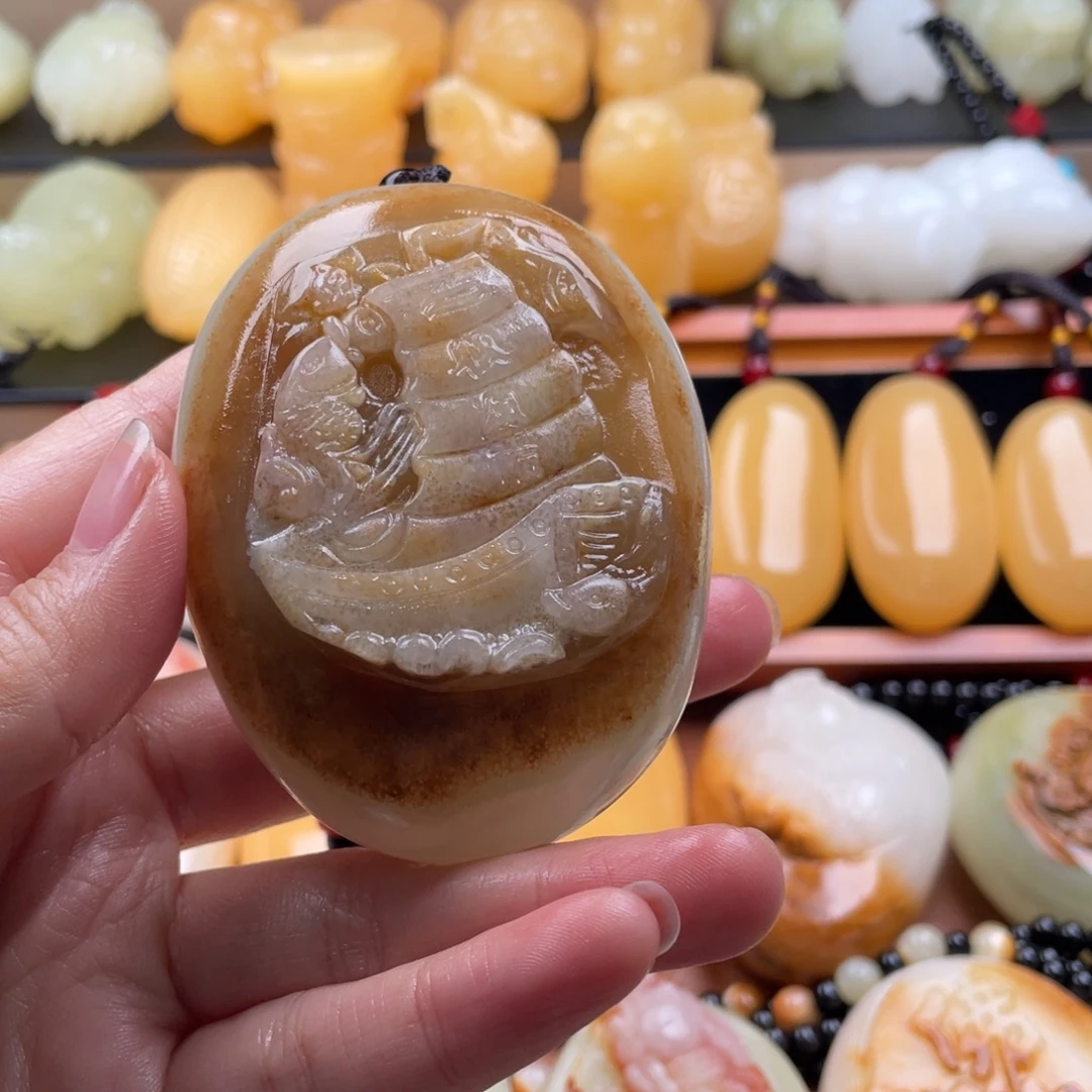 茶***）石材天然古青石手把件