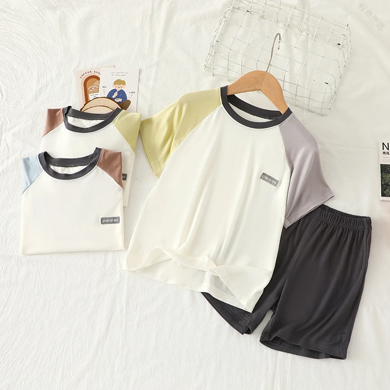 巴拉扣扣爆卖款~莫代尔儿童套装男童短袖两件套女童空调服女孩睡