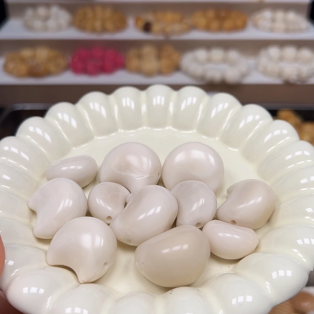 手串菩提根/象牙果瑕疵白月亮11颗表面孔道有裂