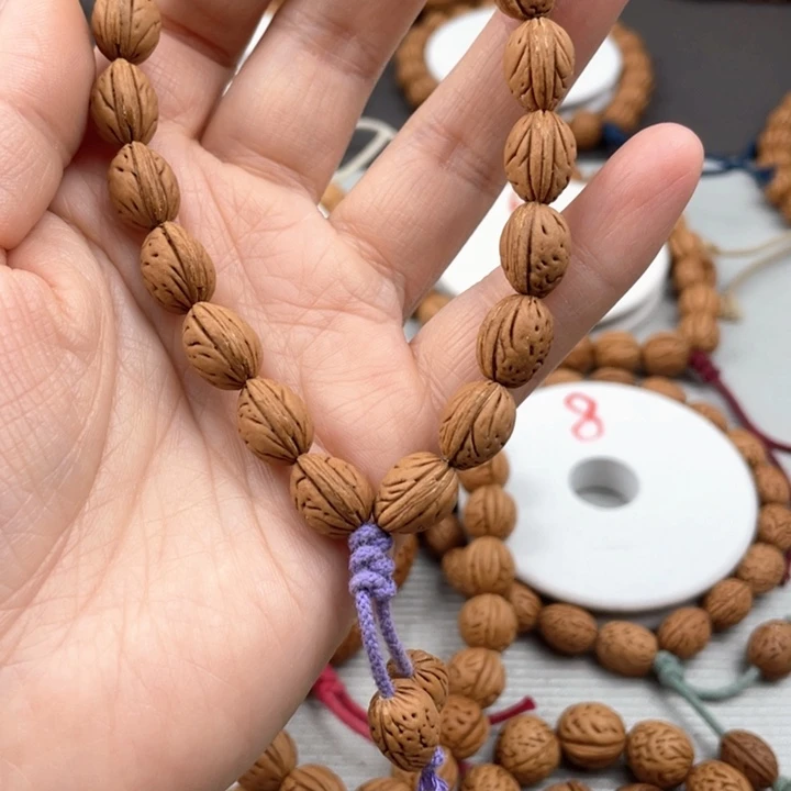 燕***花0.98尺寸野生桃核手持