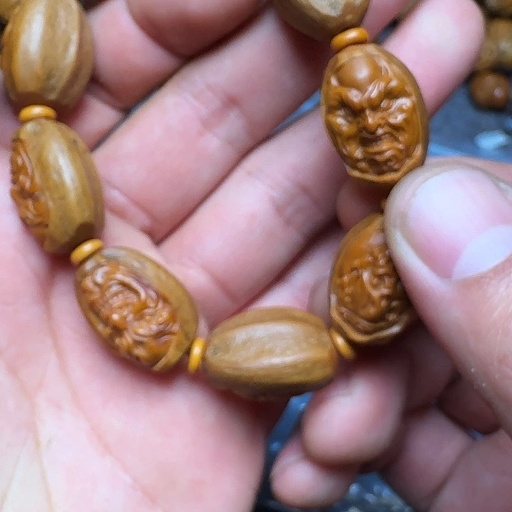 橄榄核手串你是谁