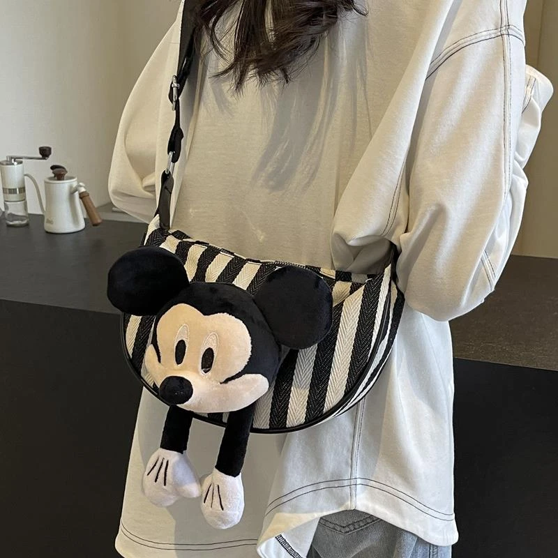 可爱卡通条纹帆布包包女2025新款夏季季休闲单肩包通勤斜挎饺子包