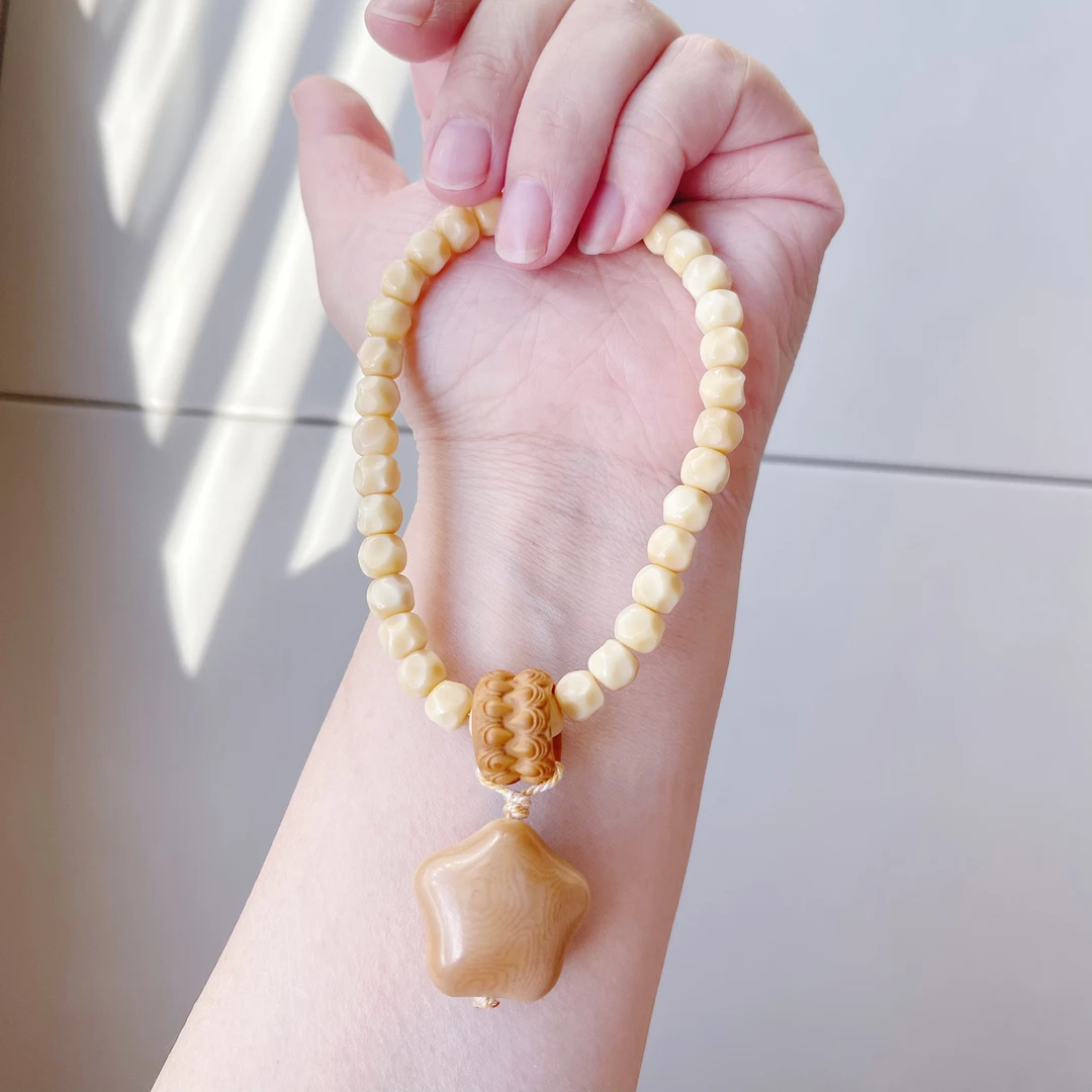 天然龙脊菩提奶酪胖星星手持无相文玩橄榄核跑环手串风化象牙果