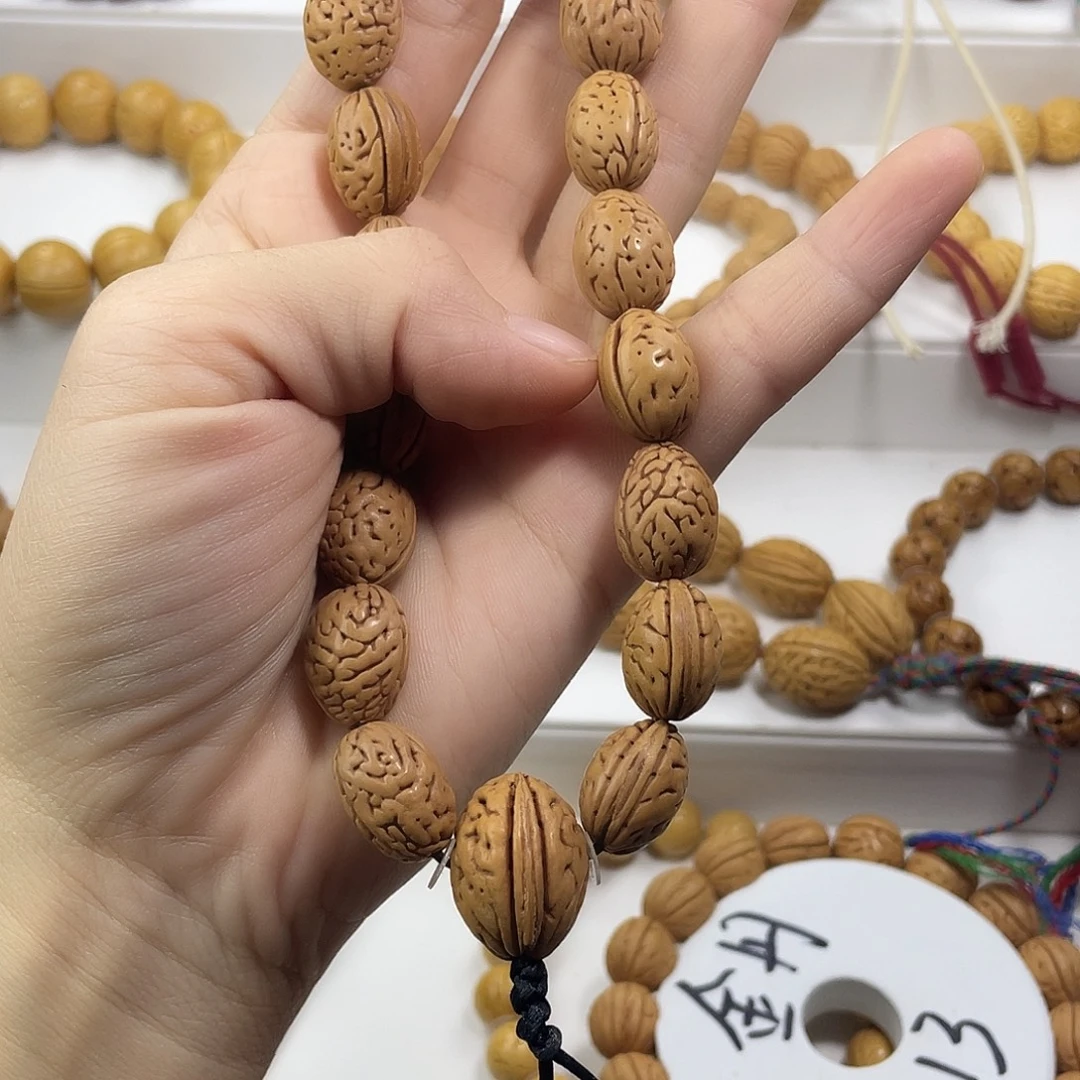 京***全东北脑纹桃核 小钱袋手持