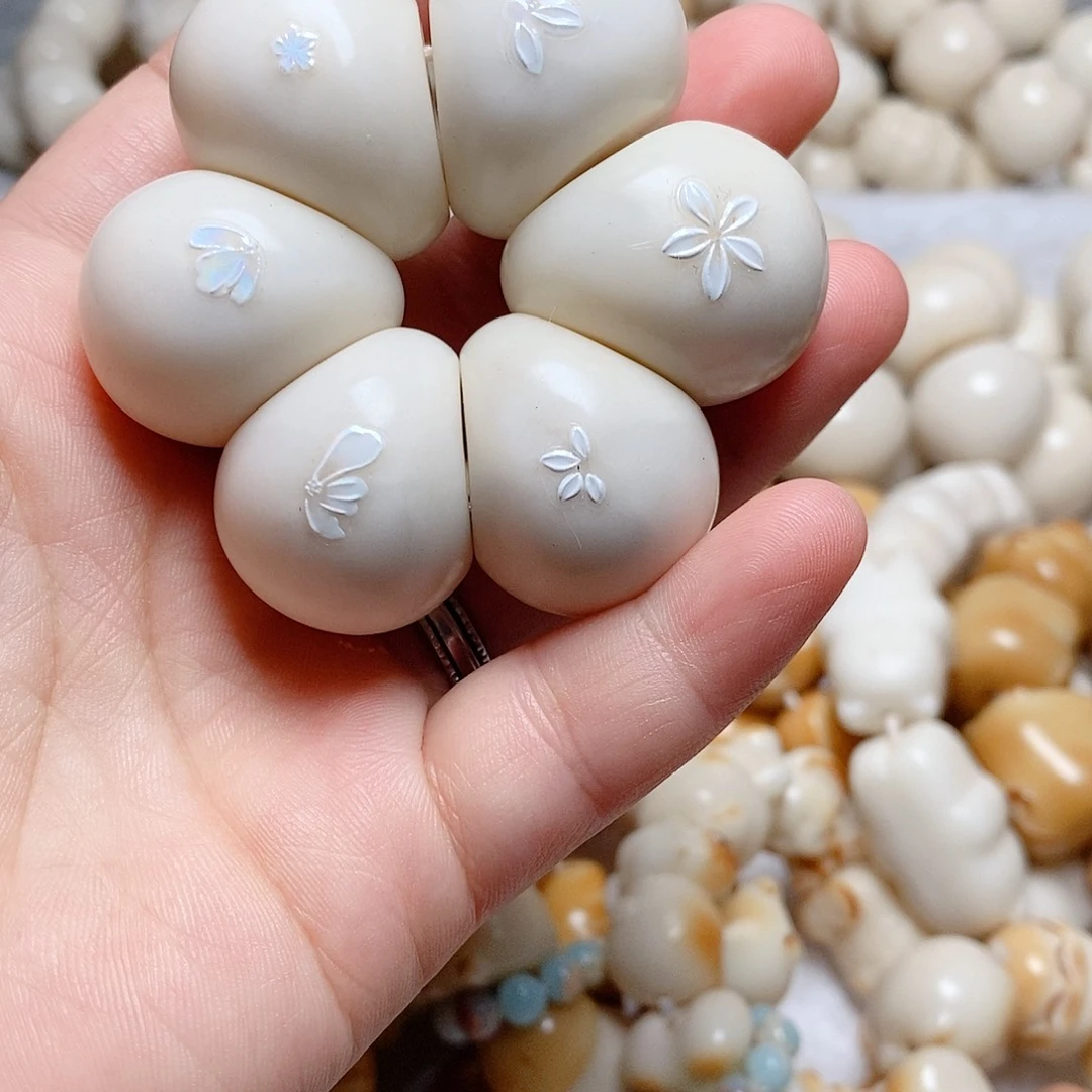 菩提根/象牙果把件瑕疵款蒜瓣手捻
