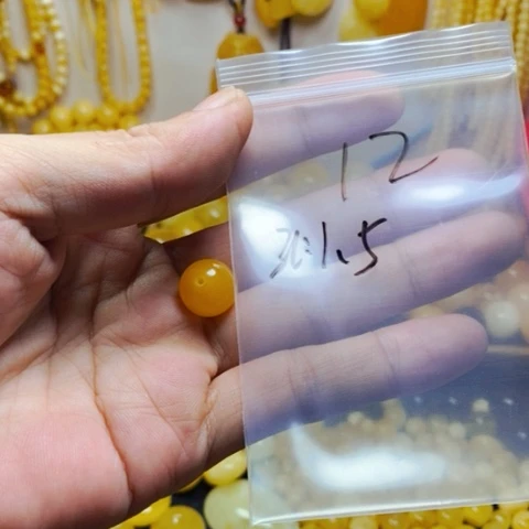 未镶嵌蜜蜡裸石W****丶天然蜜蜡鸡油黄13.1圆珠