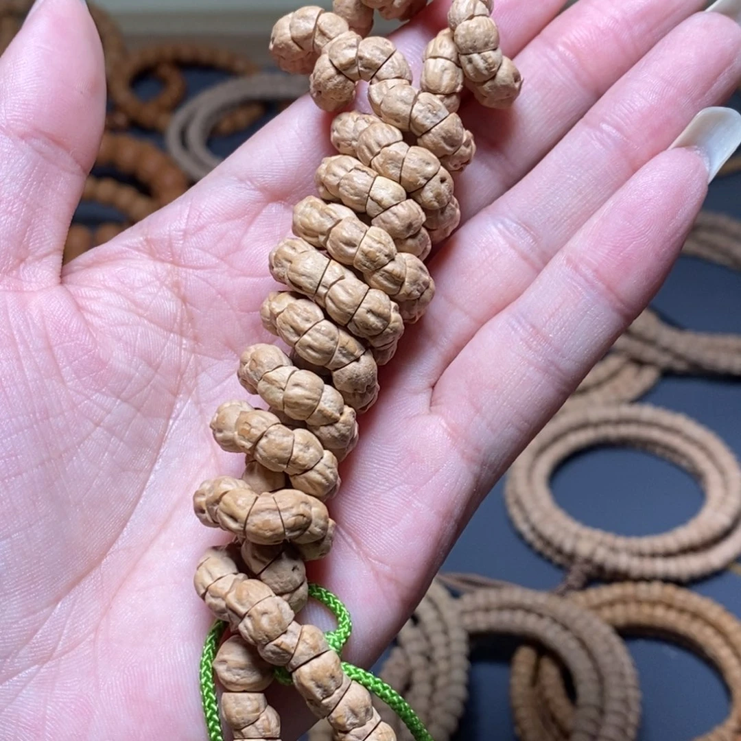 柏香籽/百香籽吊坠6.5毫米左右粉皮大肠