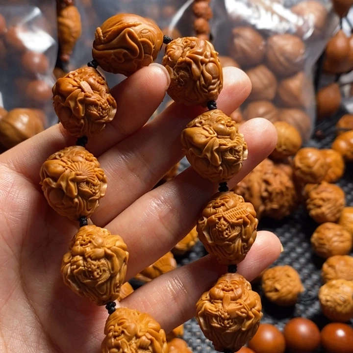 橄榄核吊坠旸财源滚滚