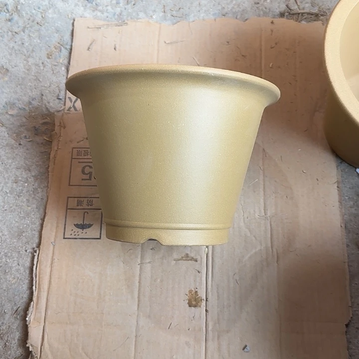 乐***.22×16四只黄段泥斗盆