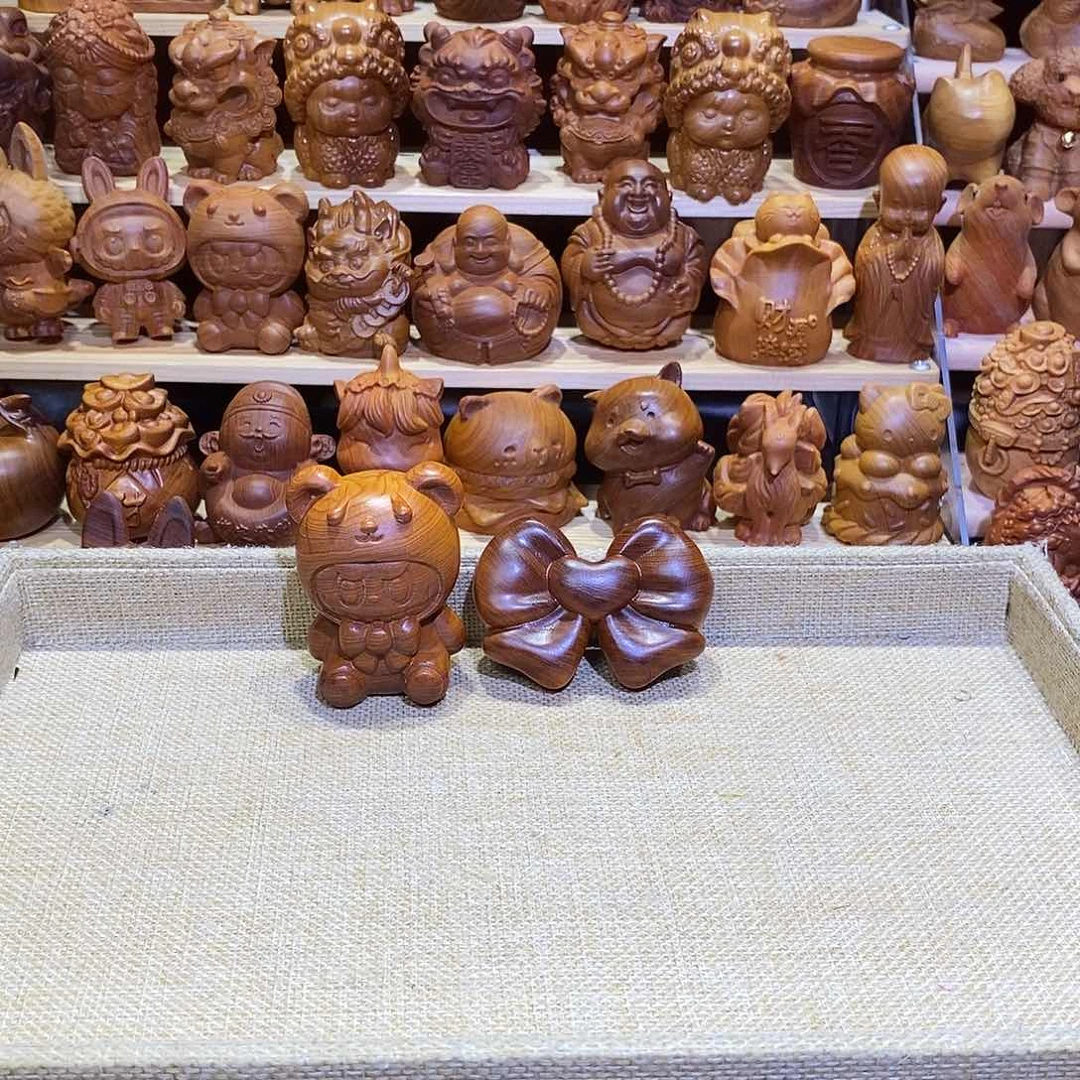 大***啡木崖柏木雕手把件微瑕