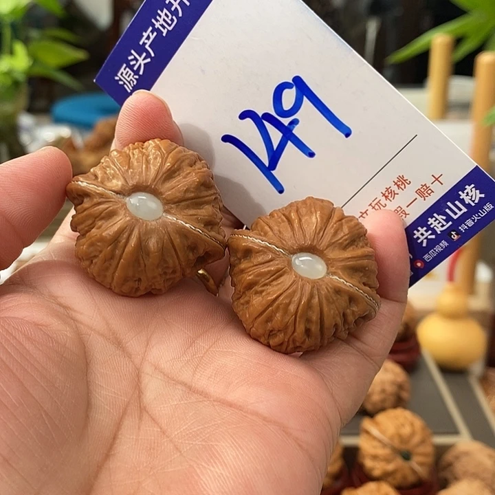 文玩核桃把件35.5银镶玉铁锤149号