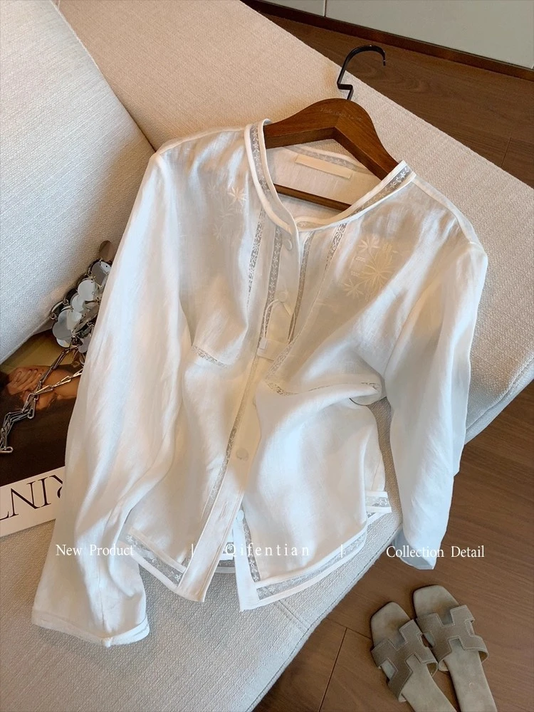 法式镂空刺绣蕾丝拼接镂空长袖衬衫女早秋高级感时尚气质宽松上衣