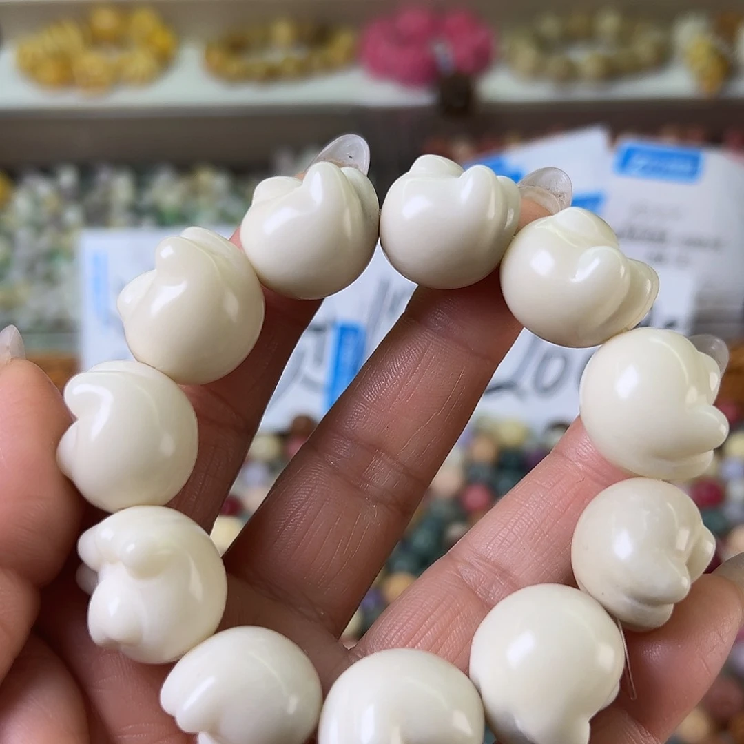 菩提根/象牙果吊坠瑕疵白爱心猫爪串一条孔道有裂