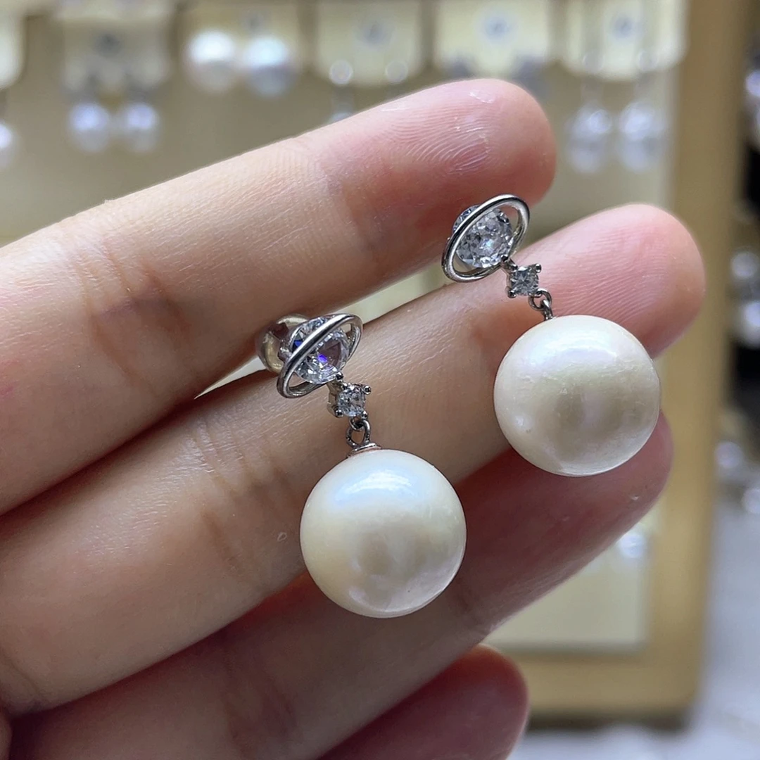淡水珍珠银S925镶嵌耳饰